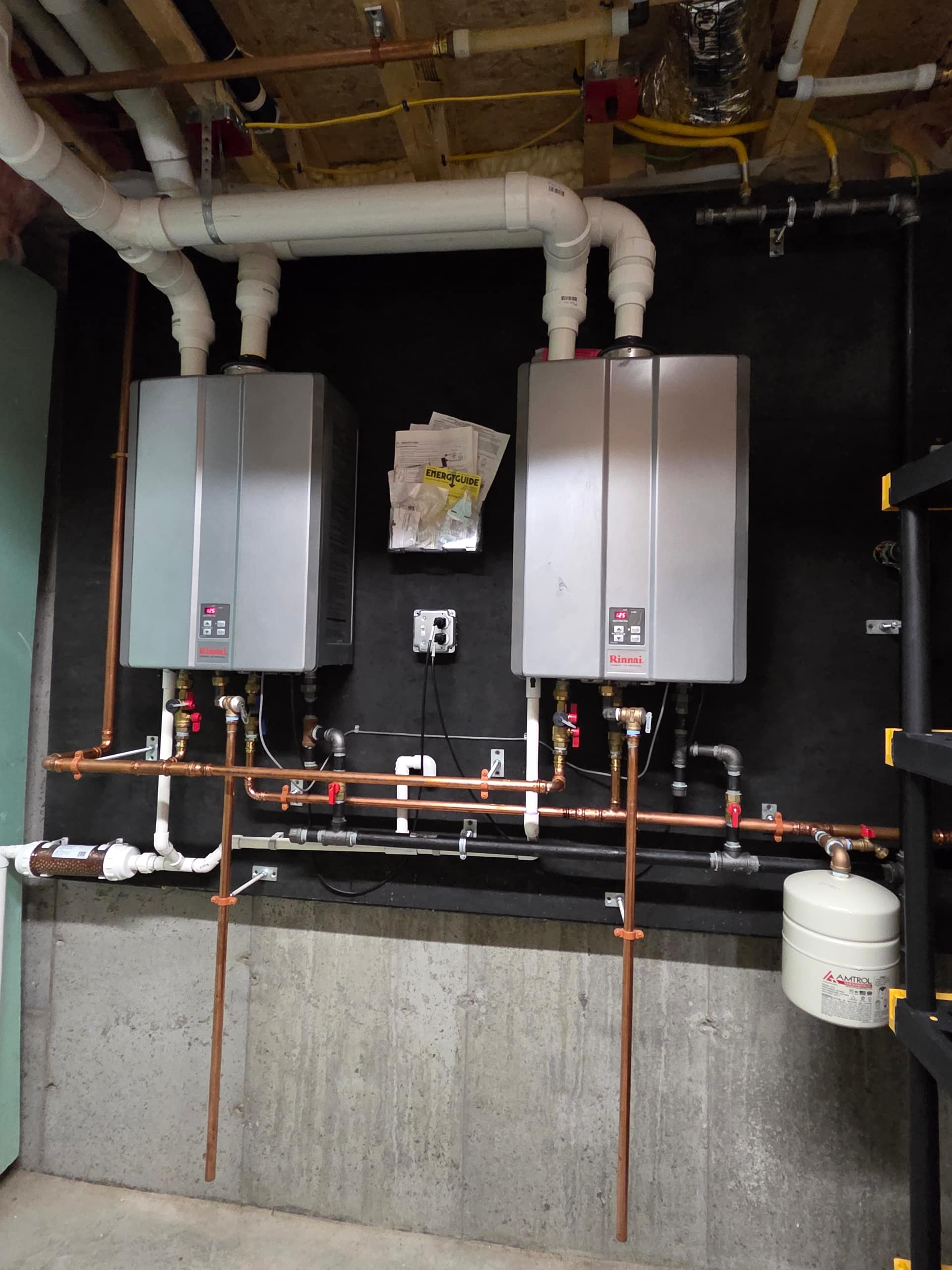 Dual wall-mounted combi boiler installation