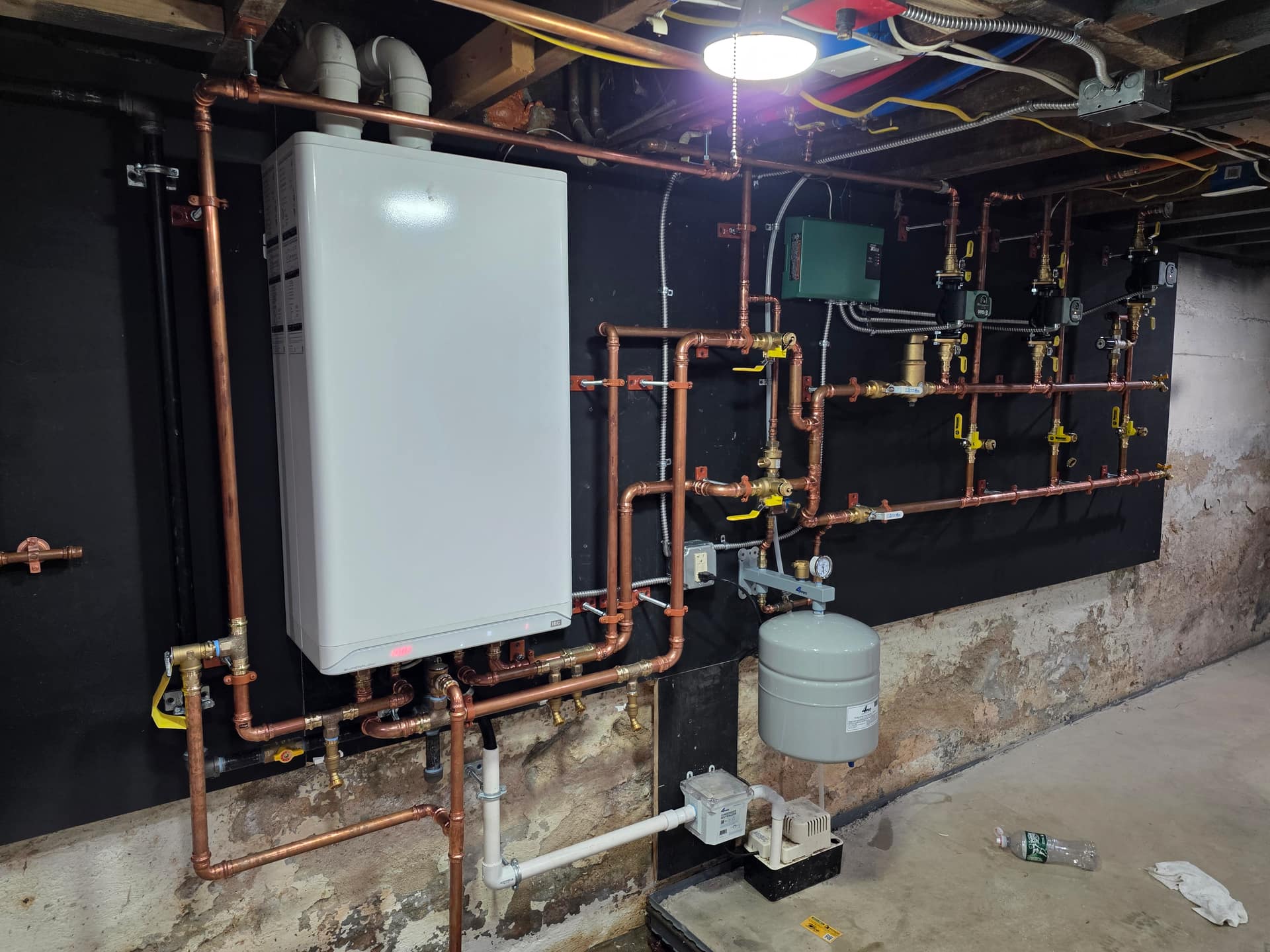 High-efficiency boiler installation by Aces Highlands in Southern Maine