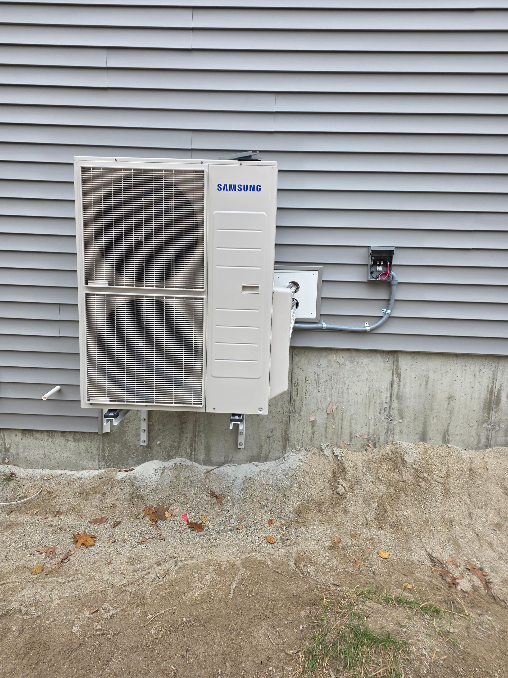 Heat pump outdoor unit installed at a residential property