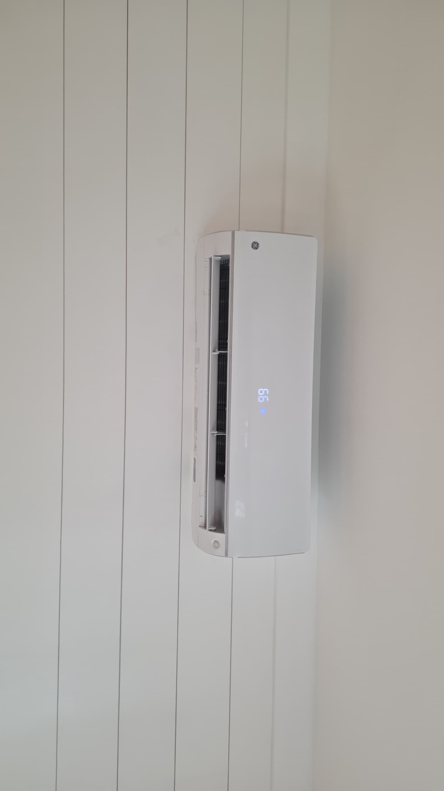 Ductless mini-split indoor head mounted high on an interior wall