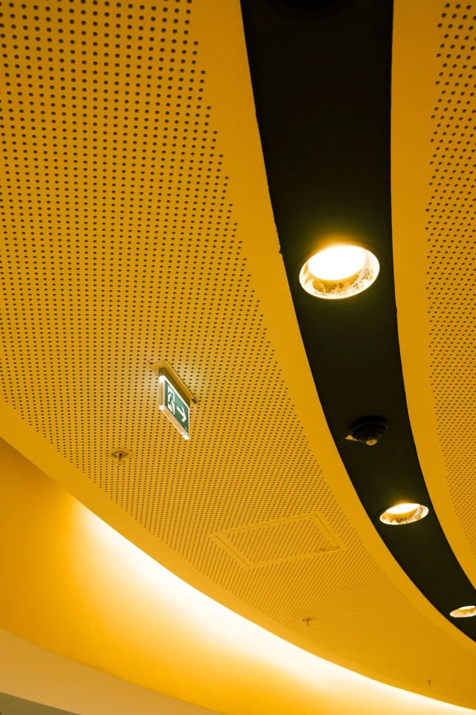 Recessed can lighting installed in a finished ceiling