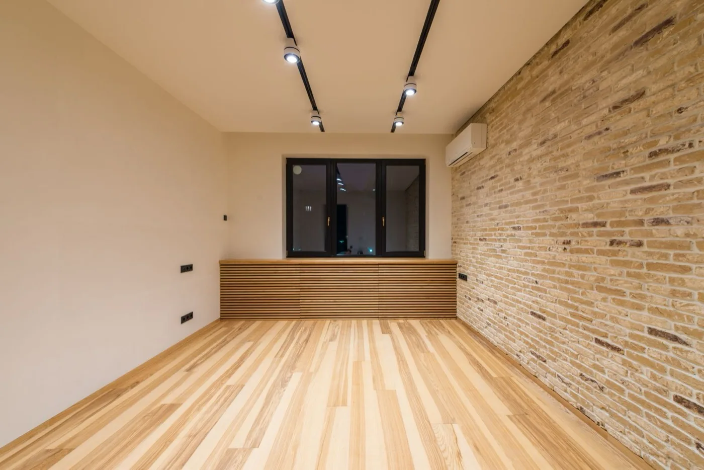 Track lighting installed in a renovated room