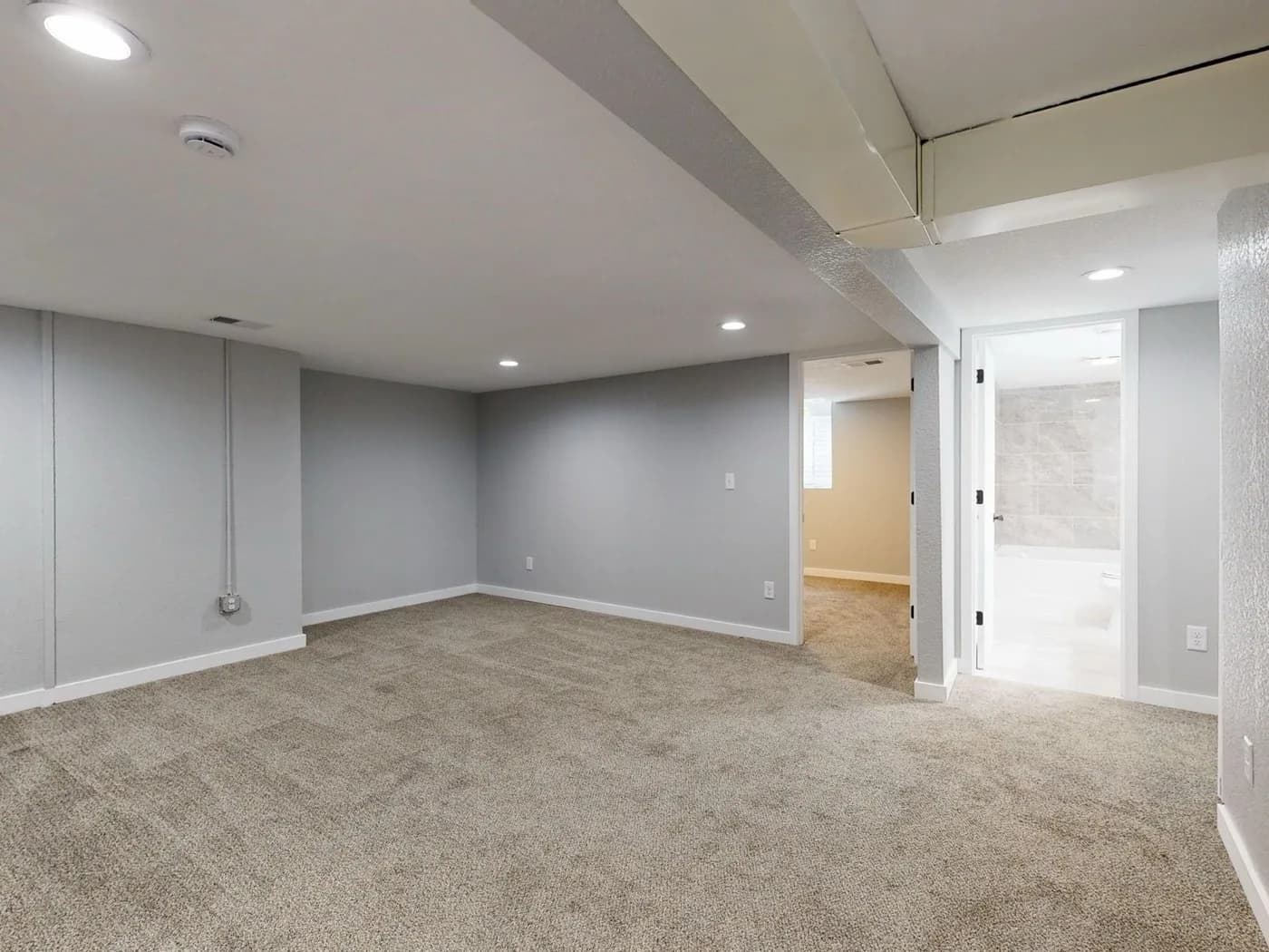 Recessed lighting installed in a finished basement