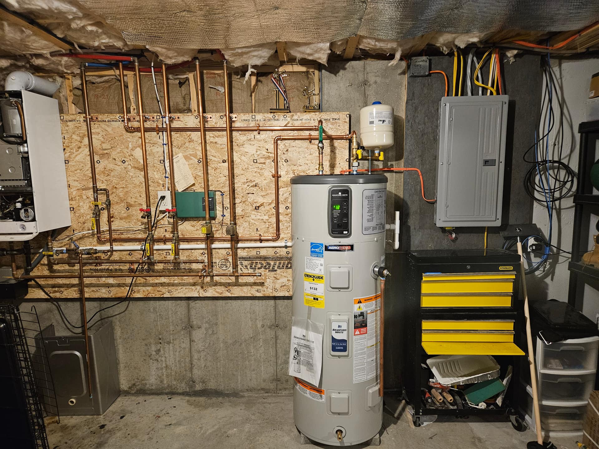 Tank water heater installed in an unfinished basement